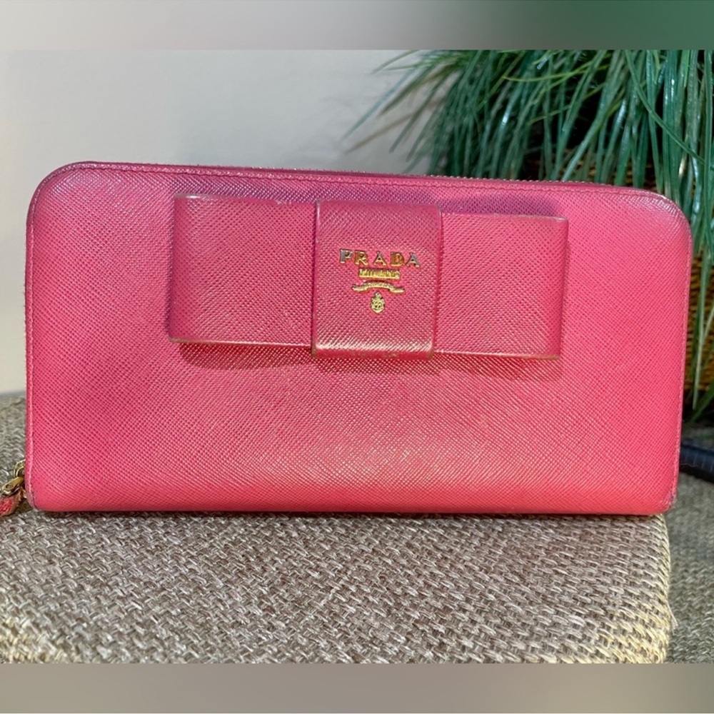 Prada Bow Pink Zip Around Long Wallet Wallet with Bow Accent and Gold
Hardware
